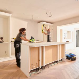kitchen fitters installing some cabinets