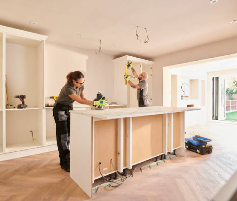 kitchen fitters installing some cabinets
